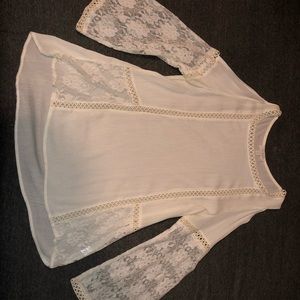 cute, loose top with lace detailing